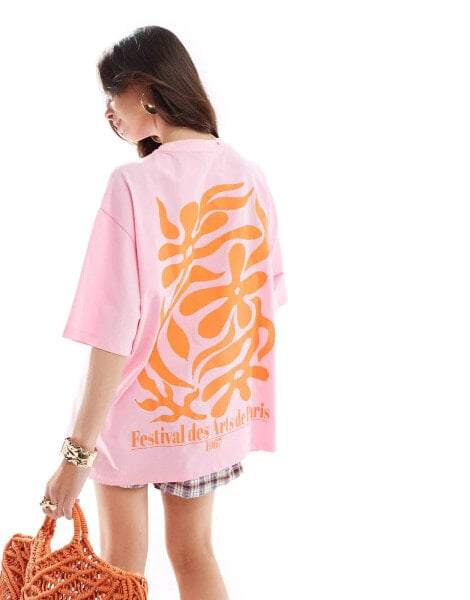 ASOS DESIGN oversized t-shirt with floral back graphic in pink