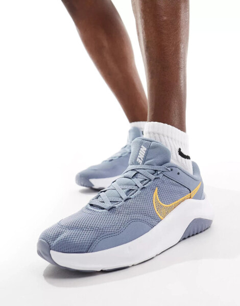 Nike Training Legend Essential 3 trainers in light grey and blue