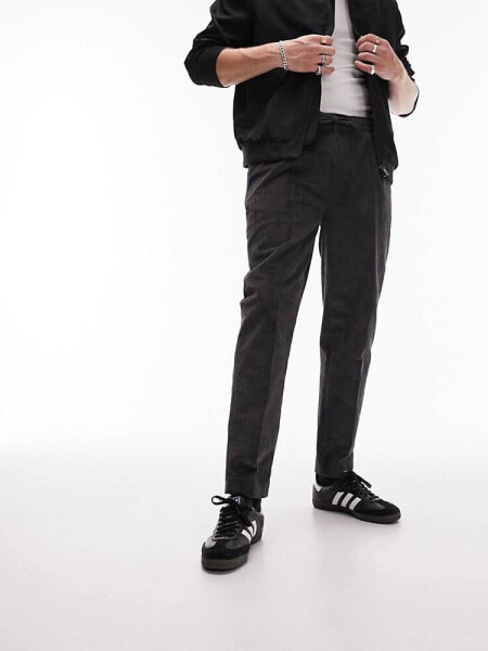 Topman tapered cord trousers in charcoal