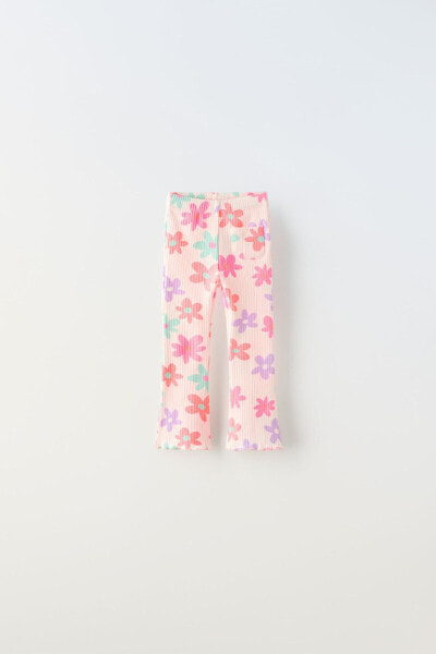 Flared ribbed floral trousers