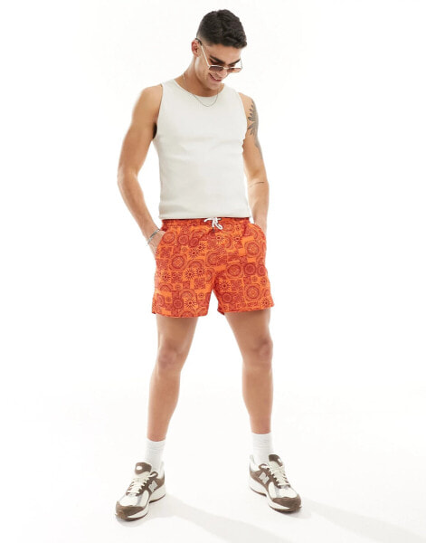 Another Influence swim shorts in orange sunny geo print