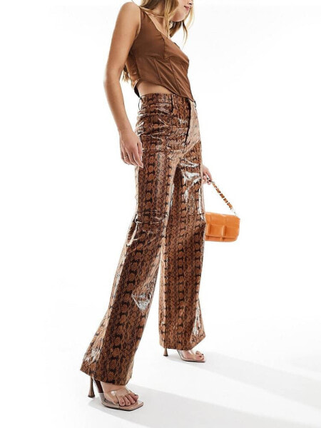 ASOS DESIGN leather look wide leg trousers in animal