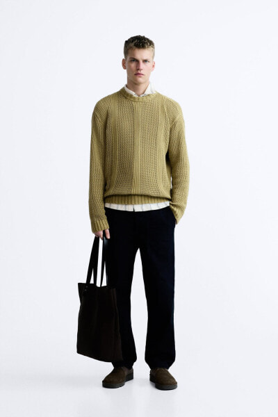 Textured open-knit sweater