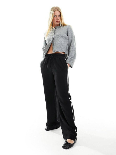 ASOS DESIGN pull on trouser with contrast piping in black