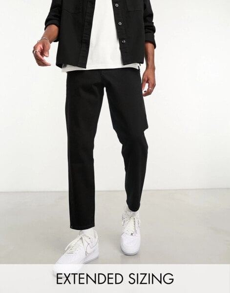 ASOS DESIGN tapered fit jeans in black - BLACK