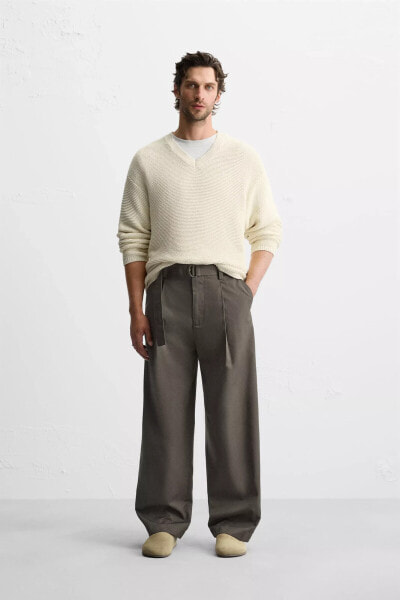 BELTED PLEATED TROUSERS