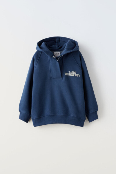 Hoodie with flocked slogan