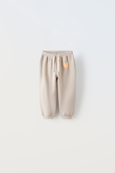 Plush trousers with raised detail