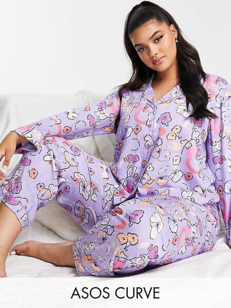 ASOS DESIGN Curve exclusive modal floral shirt & trouser pyjama set in purple