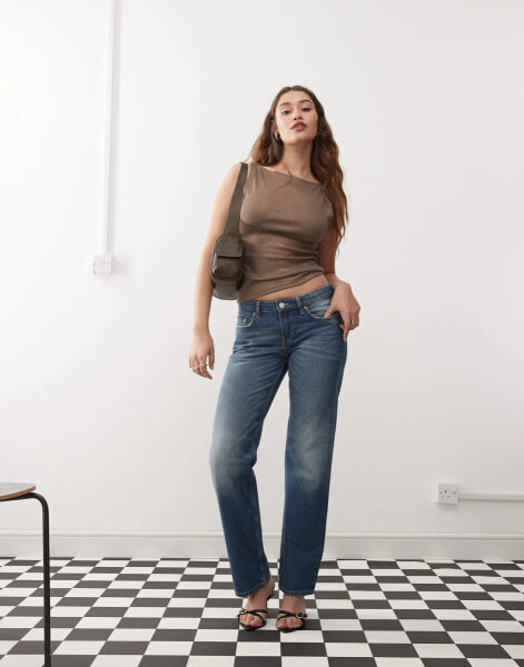 Weekday Arrow low waist regular fit straight leg jeans in streaky blue wash