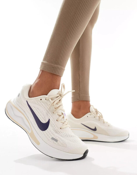 Nike Running Journey Run trainers in white and navy