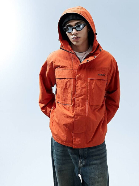 Parlez nylon rain jacket in burnt orange