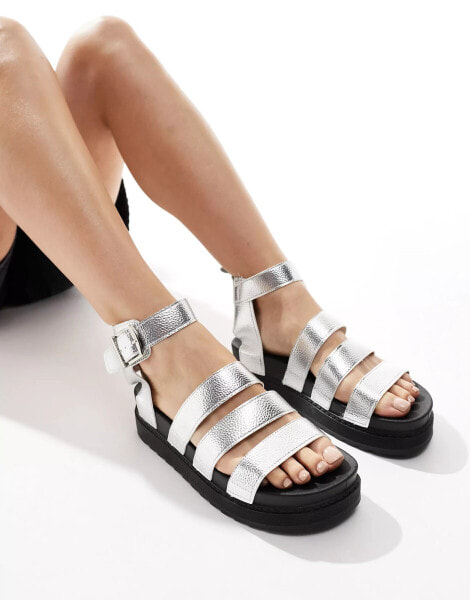 Truffle Collection wide strap sandals in silver