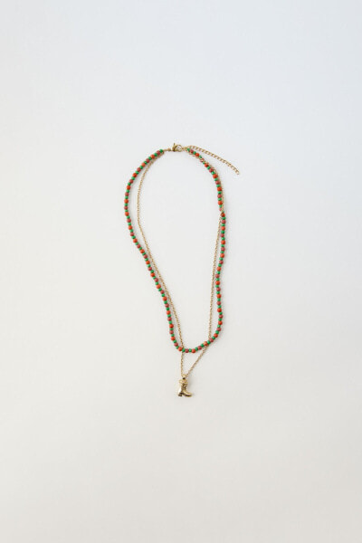 DOUBLE-STRAND NECKLACE WITH BEADS AND COWBOY BOOT