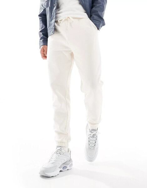 ASOS DESIGN heavyweight tapered joggers in white