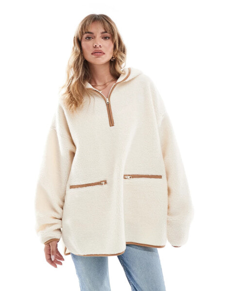 ASOS DESIGN half zip cape borg sweatshirt with tan trims in cream