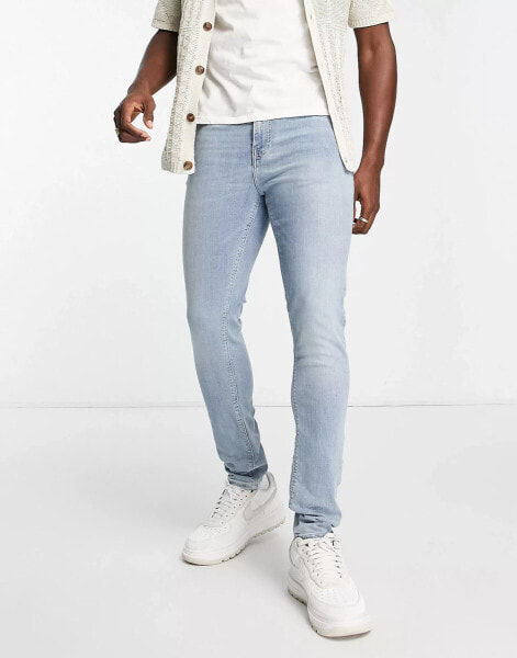 ASOS DESIGN skinny jeans in light wash blue