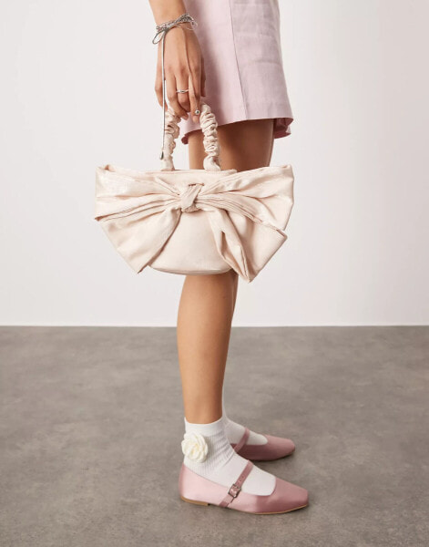 ASOS DESIGN oversized bow bag in pink