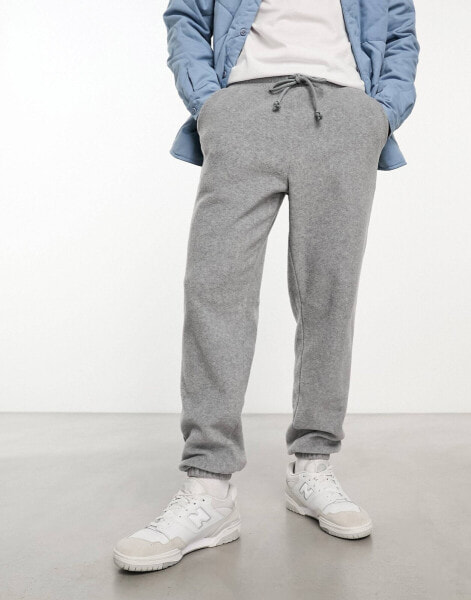 ASOS DESIGN tapered fleece joggers in grey