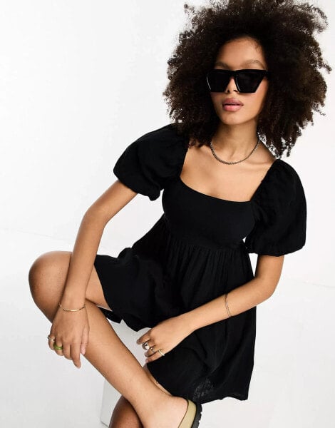 ASOS DESIGN puff sleeve smock playsuit in black