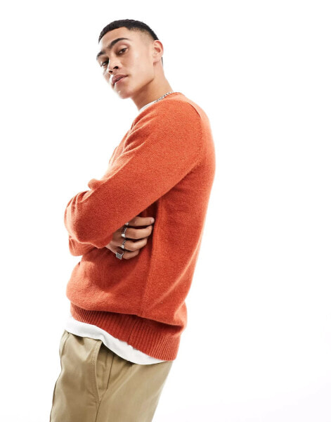 ASOS DESIGN knitted lambswool crew neck jumper in orange