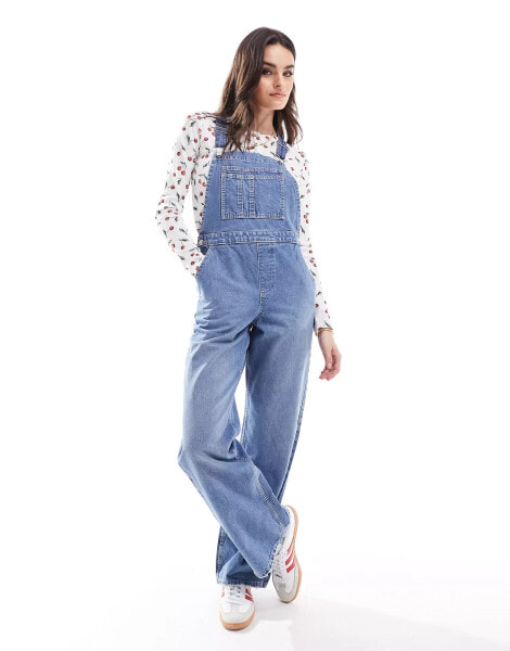 ASOS DESIGN denim dungaree in mid blue