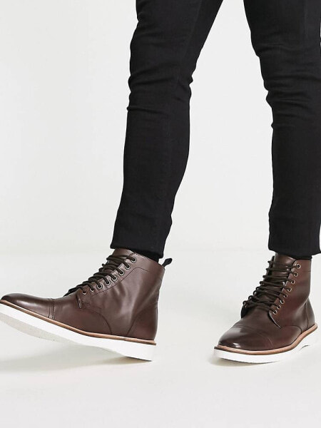 ASOS DESIGN lace up boot in brown leather with white wedge sole