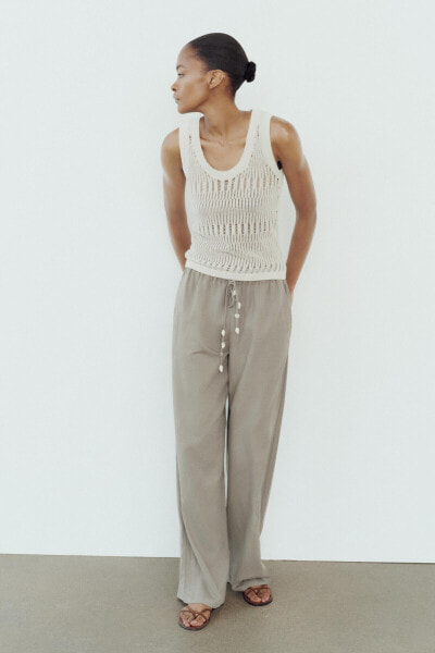 SLEEVELESS METALLIC THREAD KNIT TOP