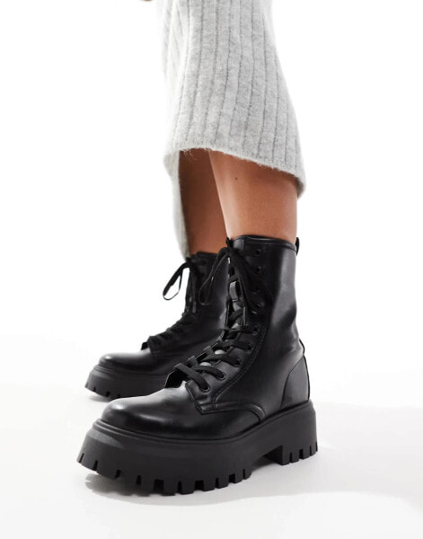 ASOS DESIGN Wide Fit Ava lace up flat boots in black