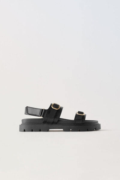 Sandals with buckles