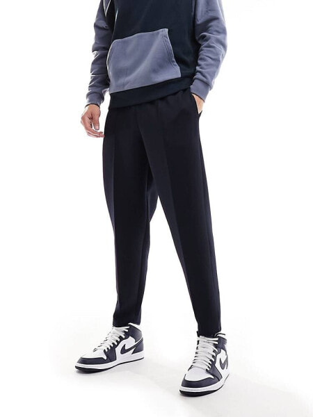 ASOS DESIGN tapered scuba joggers in navy