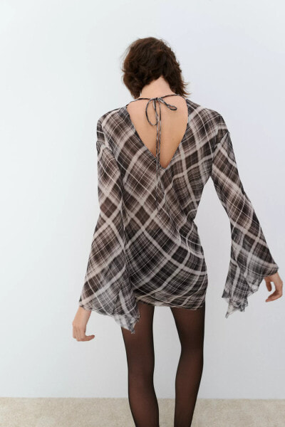 ASYMMETRIC CHECK TOP