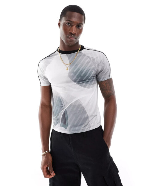 ASOS DESIGN muscle fit t-shirt in sporty all over print