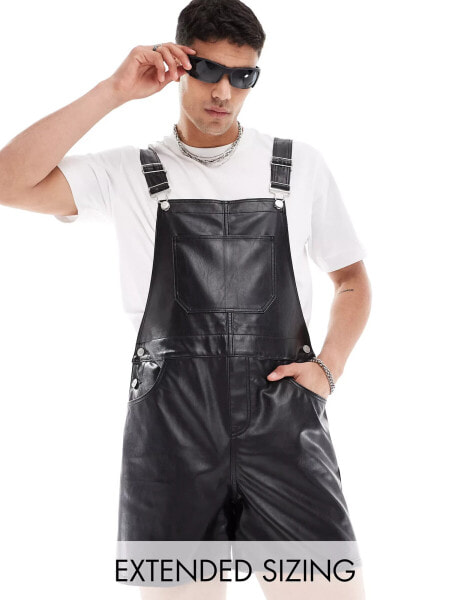 ASOS DESIGN leather look shorter length dungaree in black