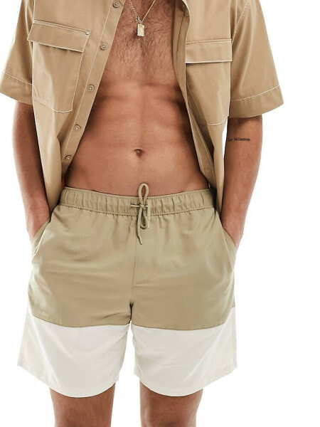 ASOS DESIGN swim shorts in mid length in khaki block print