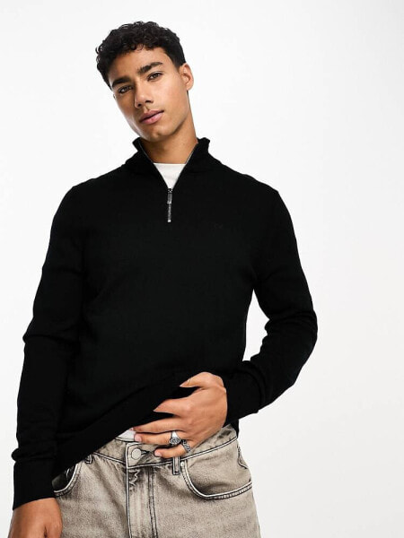 Calvin Klein – Merino-Pullover in Schwarz mit kurzem 1/4-Reißverschluss