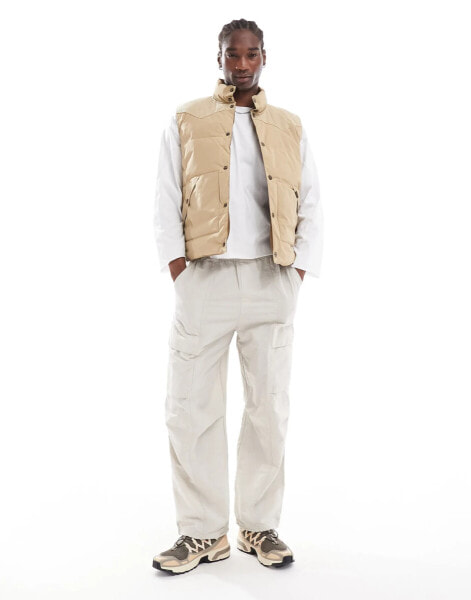 Lee reversible western puffer vest in beige/tan