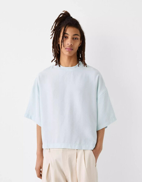 Bershka Collection cropped oversized t-shirt in blue