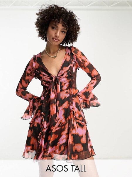 ASOS DESIGN Tall ruffle tie front plunge mini dress with frill sleeves in burnt orange lava print