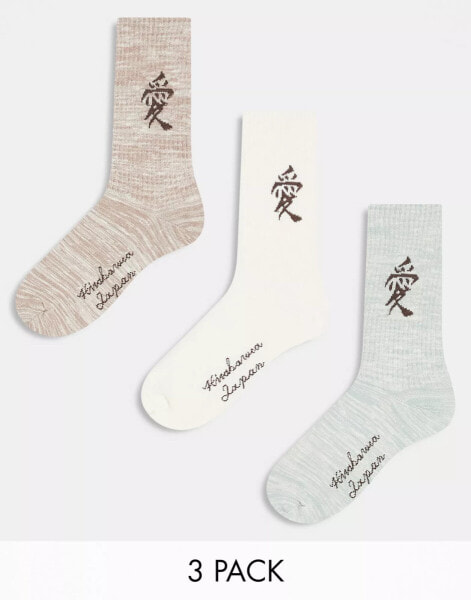 River Island – 3er-Pack Socken in verschiedenen Farben mit aufgesticktem japanischem Schriftzeichen