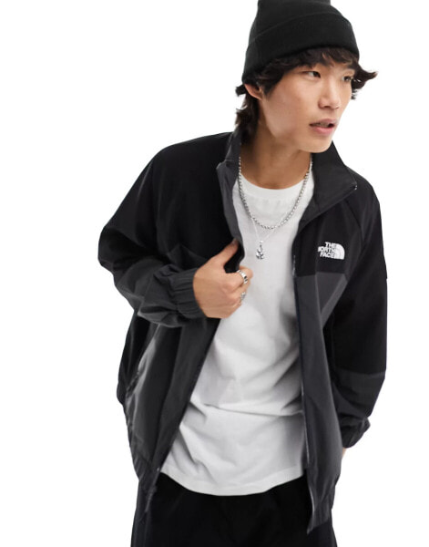 The North Face NSE shell track jacket in black