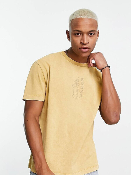 ASOS DESIGN relaxed t-shirt in washed yellow with cowgirl chest print