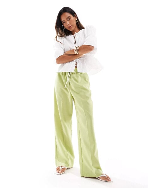 ASOS DESIGN tailored pull on trouser in light green