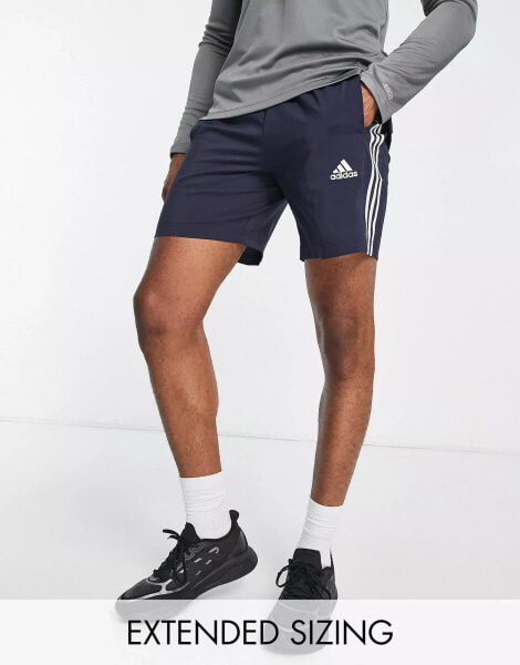 adidas Sportswear essentials 3 stripes shorts in navy and white