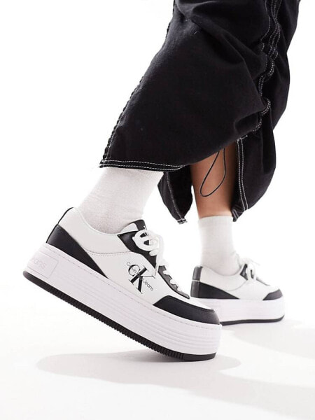 Calvin Klein Jeans bold flatform trainers in black & white