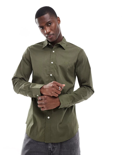 Levi's Battery tonal batwing logo button down poplin shirt in olive green