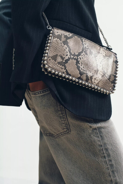 CLUTCH BAG WITH STUDS