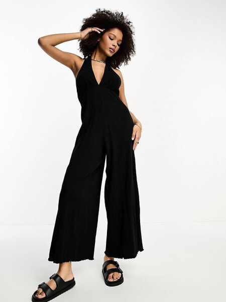 ASOS DESIGN crinkle jersey halter jumpsuit in black