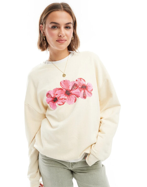 ASOS DESIGN – Oversize-Sweatshirt in Ecru mit Hibiskus-Grafikprint