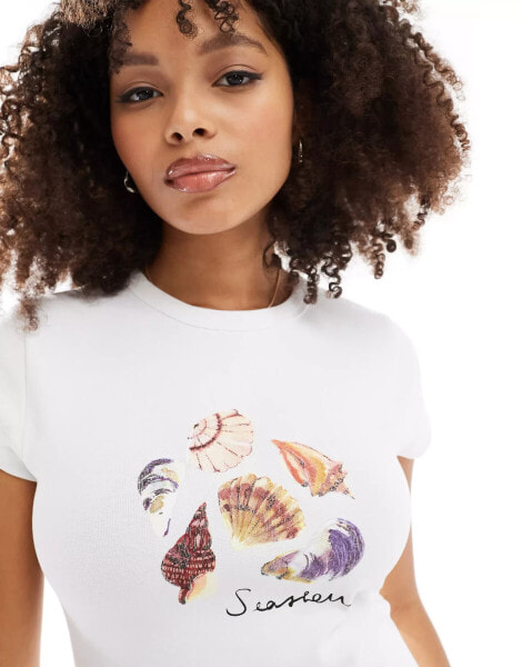 ASOS DESIGN baby tee with seashells graphic in white